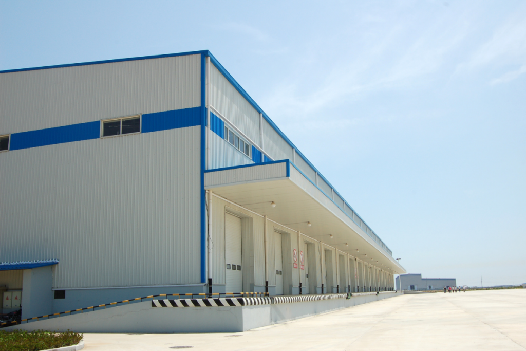 Exterior view of a modern warehouse representing warehousing and logistics solutions.